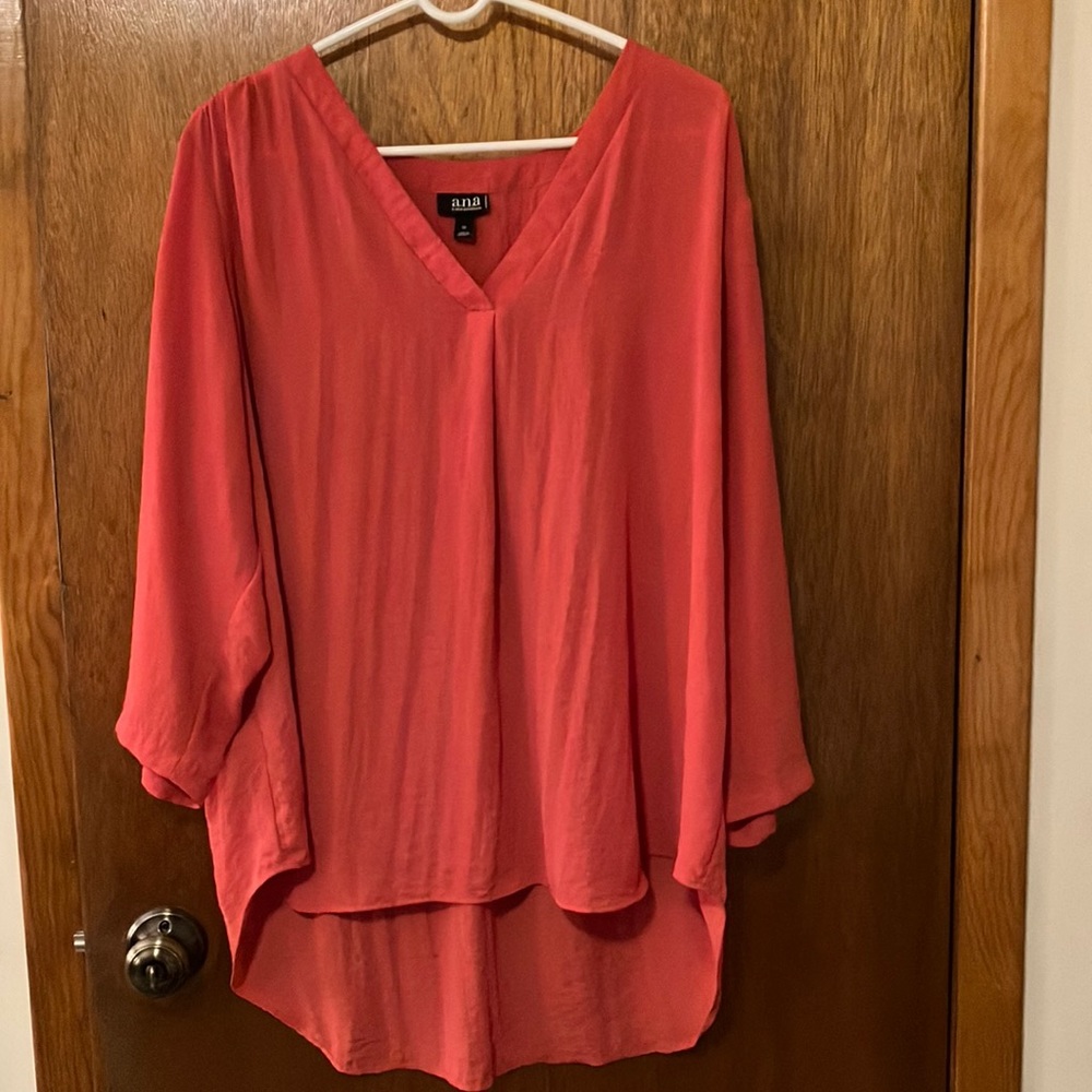 Light weight, polyester , coral women’s top.